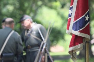 Civil War reenacts in Confederate uniforms