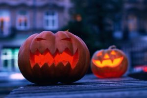 ghost tours on historic street with pumpkins