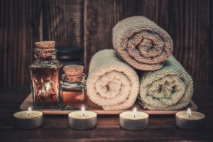 Spa supplies towels, candles and oils