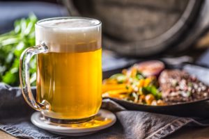 Glass of beer with delicious food at Bardstown Restaurants